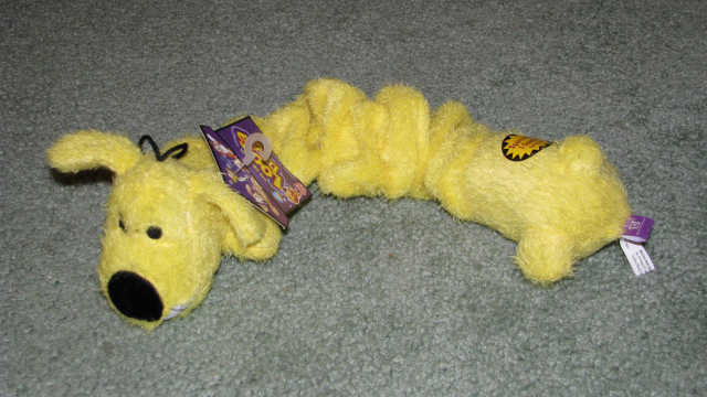 Yellow loofa dog toy.